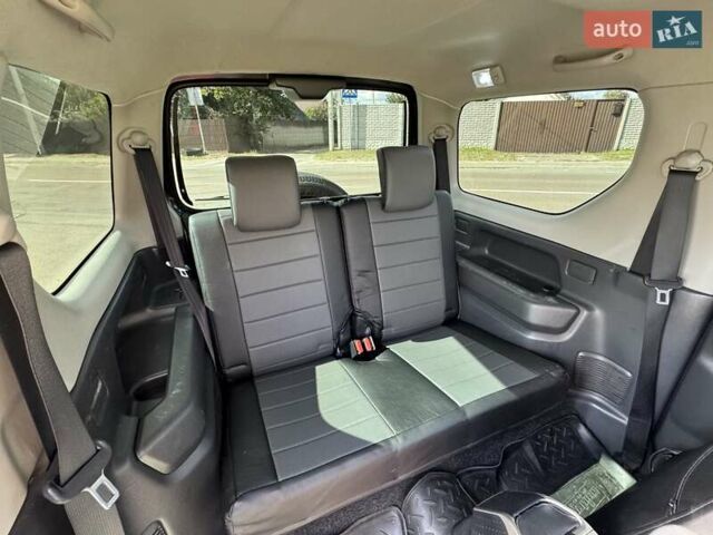 Сірий Сузукі Джімні, об'ємом двигуна 1.3 л та пробігом 43 тис. км за 16500 $, фото 11 на Automoto.ua