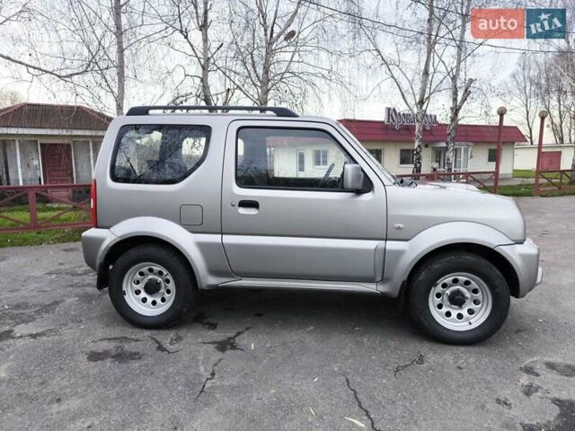 Серый Сузуки Джимни, объемом двигателя 1.3 л и пробегом 90 тыс. км за 13999 $, фото 5 на Automoto.ua