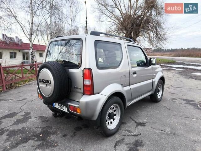 Серый Сузуки Джимни, объемом двигателя 1.33 л и пробегом 92 тыс. км за 13999 $, фото 24 на Automoto.ua