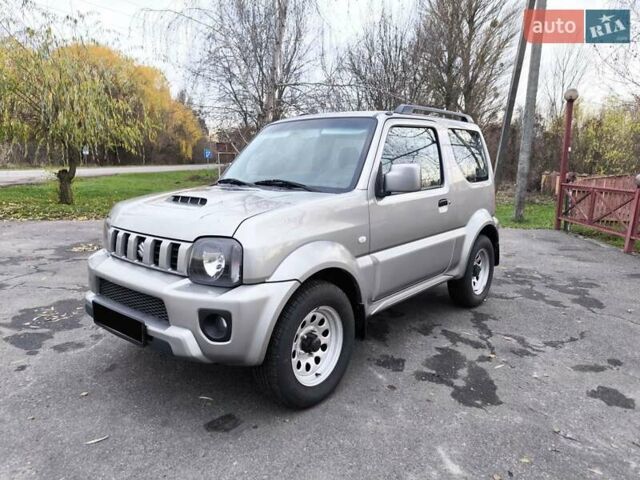 Серый Сузуки Джимни, объемом двигателя 1.3 л и пробегом 90 тыс. км за 13999 $, фото 2 на Automoto.ua