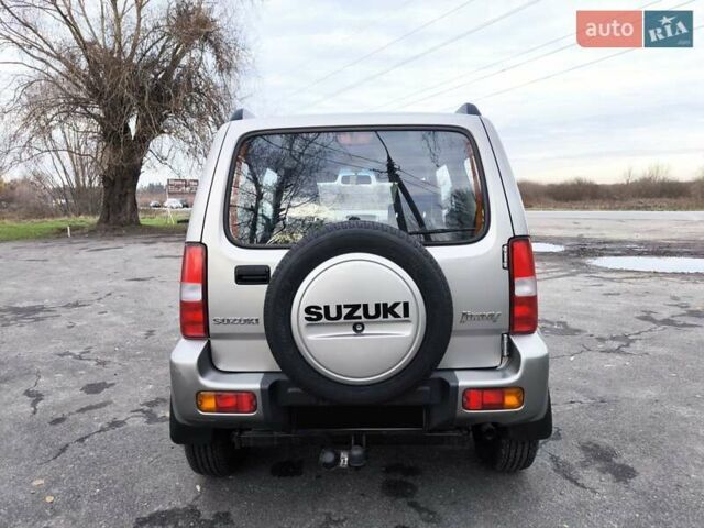 Серый Сузуки Джимни, объемом двигателя 1.3 л и пробегом 90 тыс. км за 13999 $, фото 7 на Automoto.ua