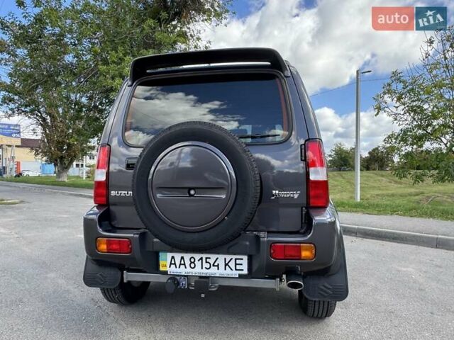 Сірий Сузукі Джімні, об'ємом двигуна 1.3 л та пробігом 43 тис. км за 16500 $, фото 3 на Automoto.ua