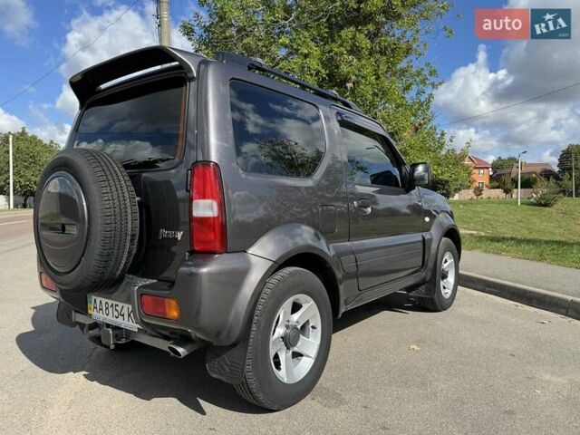 Сірий Сузукі Джімні, об'ємом двигуна 1.3 л та пробігом 43 тис. км за 16500 $, фото 5 на Automoto.ua