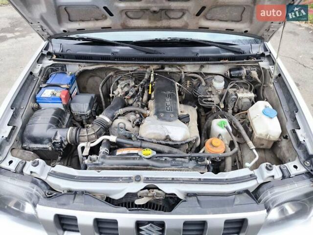 Серый Сузуки Джимни, объемом двигателя 1.3 л и пробегом 92 тыс. км за 14900 $, фото 28 на Automoto.ua