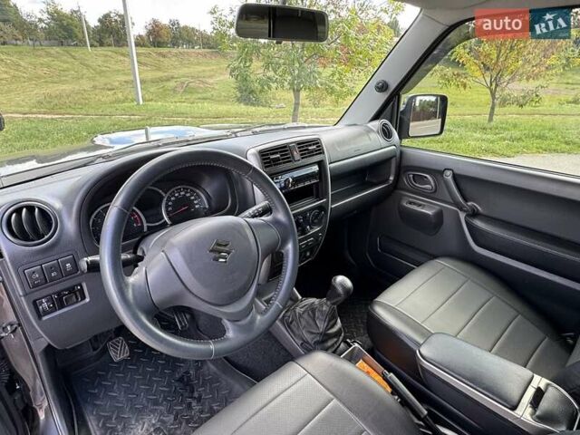 Сірий Сузукі Джімні, об'ємом двигуна 1.3 л та пробігом 43 тис. км за 16500 $, фото 8 на Automoto.ua
