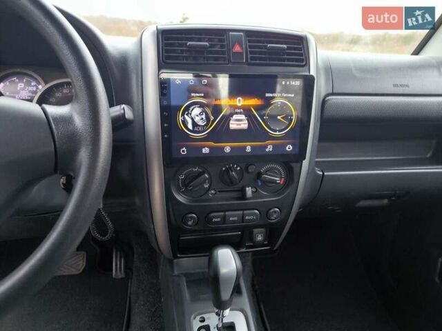 Серый Сузуки Джимни, объемом двигателя 1.3 л и пробегом 90 тыс. км за 13999 $, фото 11 на Automoto.ua