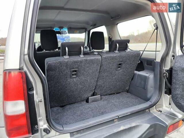 Серый Сузуки Джимни, объемом двигателя 1.3 л и пробегом 92 тыс. км за 14900 $, фото 23 на Automoto.ua