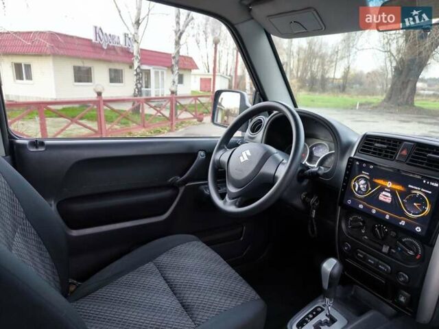 Серый Сузуки Джимни, объемом двигателя 1.3 л и пробегом 90 тыс. км за 13999 $, фото 14 на Automoto.ua