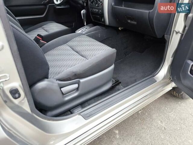 Серый Сузуки Джимни, объемом двигателя 1.33 л и пробегом 92 тыс. км за 13999 $, фото 1 на Automoto.ua