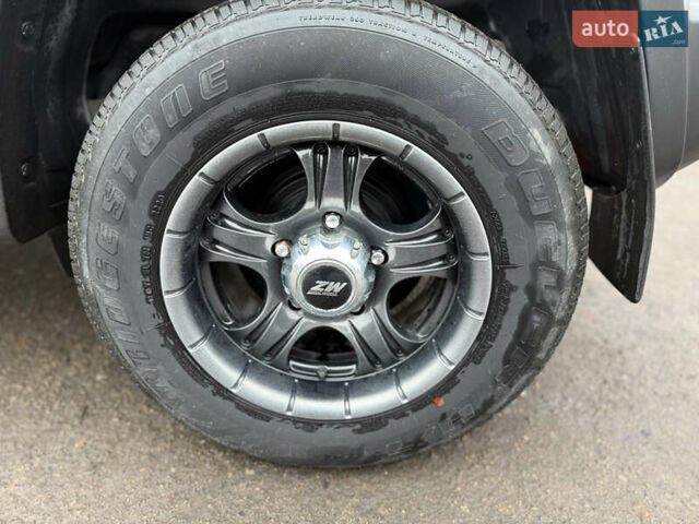 Серый Сузуки Джимни, объемом двигателя 1.46 л и пробегом 26 тыс. км за 21500 $, фото 16 на Automoto.ua