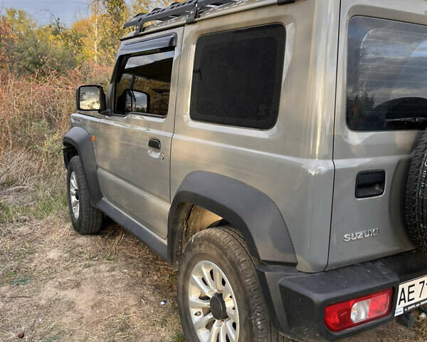 Серый Сузуки Джимни, объемом двигателя 1.46 л и пробегом 50 тыс. км за 20000 $, фото 2 на Automoto.ua