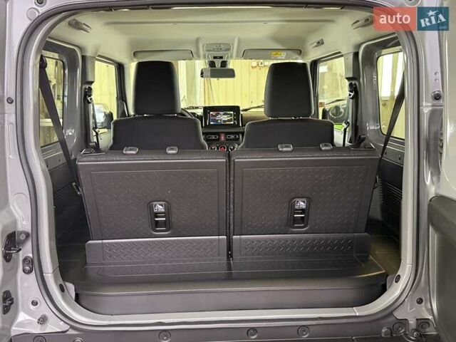 Сірий Сузукі Джімні, об'ємом двигуна 1.5 л та пробігом 6 тис. км за 24950 $, фото 62 на Automoto.ua