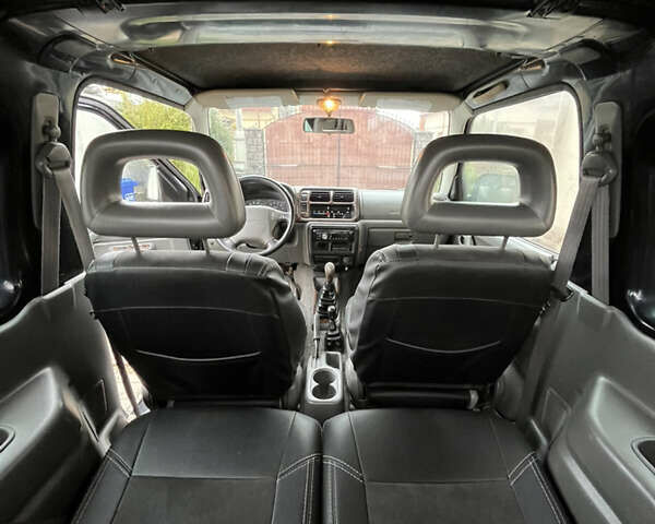 Синій Сузукі Джімні, об'ємом двигуна 1.3 л та пробігом 172 тис. км за 7150 $, фото 33 на Automoto.ua