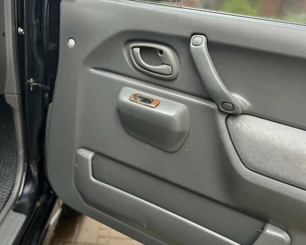 Синій Сузукі Джімні, об'ємом двигуна 1.3 л та пробігом 172 тис. км за 7150 $, фото 31 на Automoto.ua