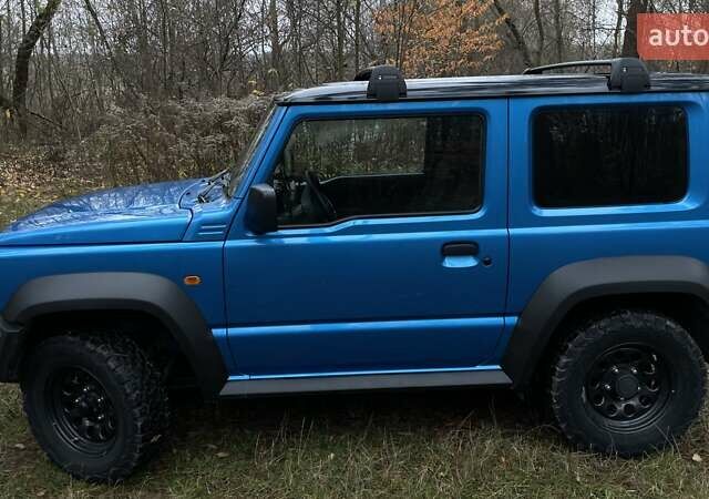 Синий Сузуки Джимни, объемом двигателя 1.46 л и пробегом 49 тыс. км за 22250 $, фото 4 на Automoto.ua