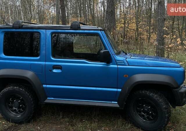 Синий Сузуки Джимни, объемом двигателя 1.46 л и пробегом 49 тыс. км за 22250 $, фото 2 на Automoto.ua