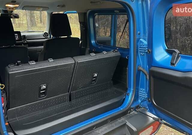 Синий Сузуки Джимни, объемом двигателя 1.46 л и пробегом 49 тыс. км за 22250 $, фото 11 на Automoto.ua