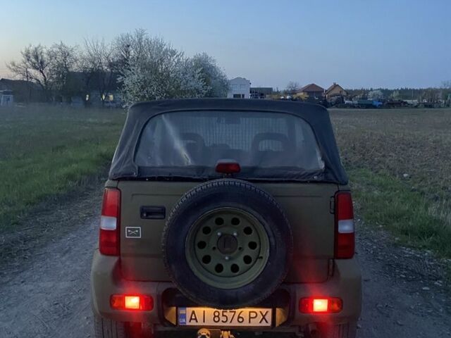 Зеленый Сузуки Джимни, объемом двигателя 1.3 л и пробегом 186 тыс. км за 6100 $, фото 3 на Automoto.ua