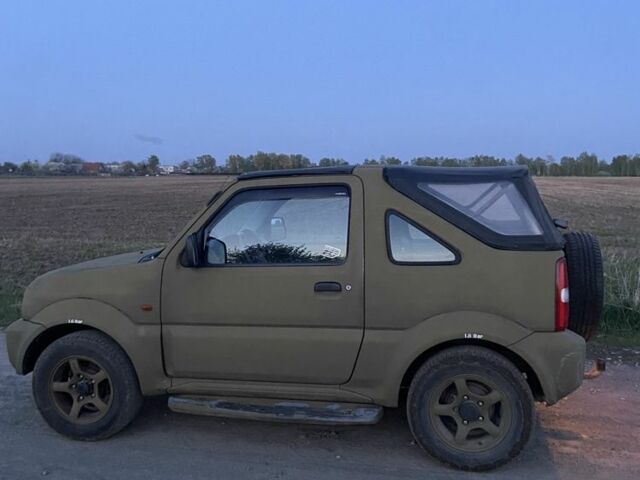 Зеленый Сузуки Джимни, объемом двигателя 1.3 л и пробегом 186 тыс. км за 6100 $, фото 5 на Automoto.ua