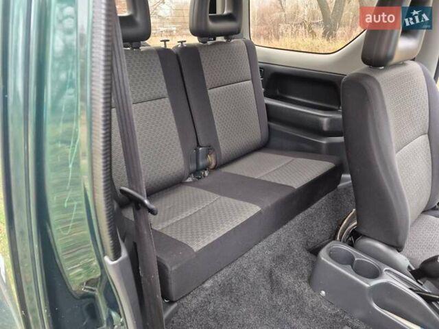 Зелений Сузукі Джімні, об'ємом двигуна 1.3 л та пробігом 170 тис. км за 8700 $, фото 14 на Automoto.ua