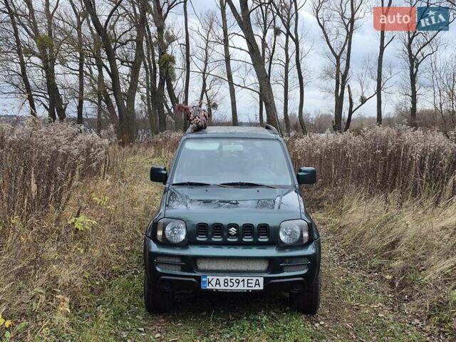 Зелений Сузукі Джімні, об'ємом двигуна 1.3 л та пробігом 170 тис. км за 8700 $, фото 2 на Automoto.ua