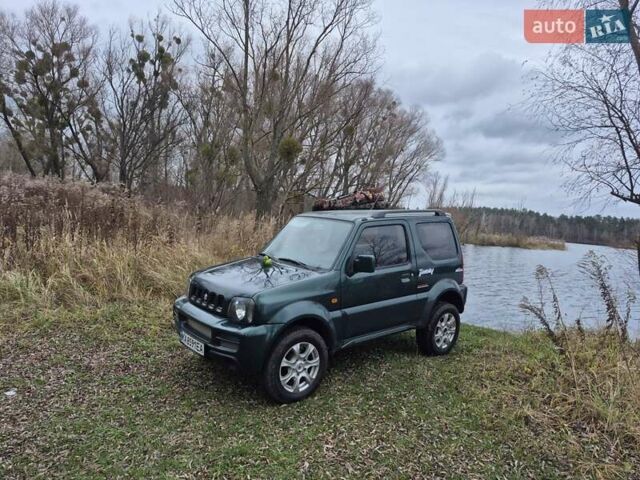 Зелений Сузукі Джімні, об'ємом двигуна 1.3 л та пробігом 170 тис. км за 8700 $, фото 4 на Automoto.ua