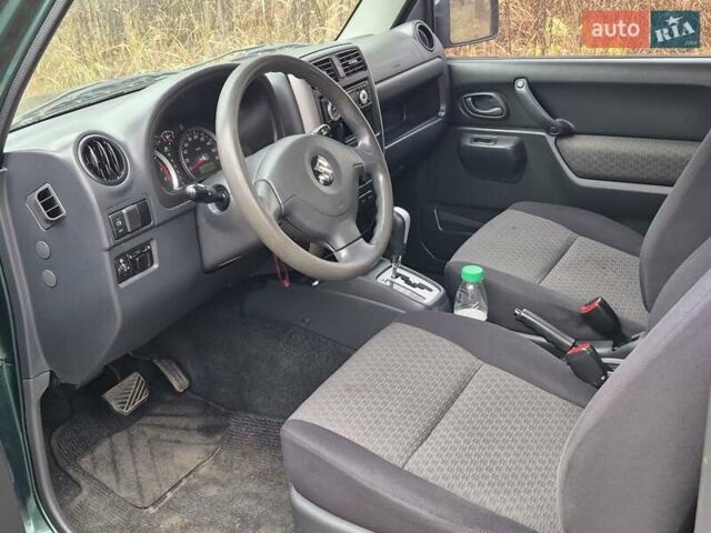 Зелений Сузукі Джімні, об'ємом двигуна 1.3 л та пробігом 170 тис. км за 8700 $, фото 17 на Automoto.ua