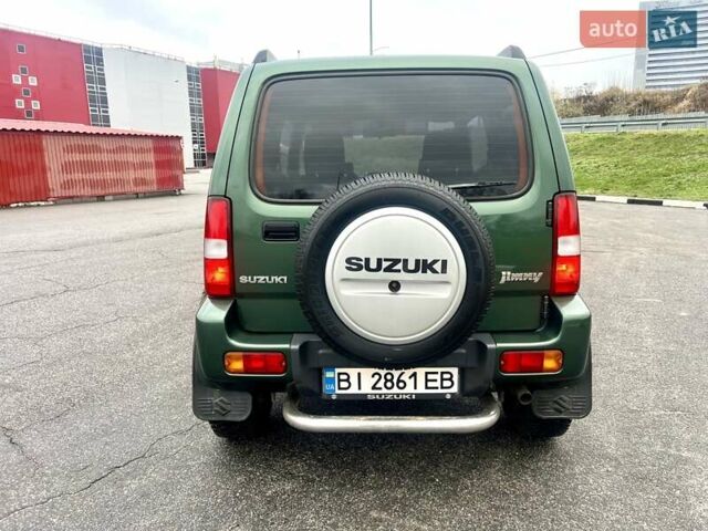 Зелений Сузукі Джімні, об'ємом двигуна 1.33 л та пробігом 112 тис. км за 12500 $, фото 4 на Automoto.ua