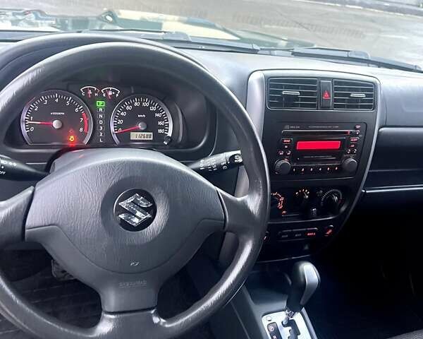 Зелений Сузукі Джімні, об'ємом двигуна 1.33 л та пробігом 112 тис. км за 12500 $, фото 11 на Automoto.ua