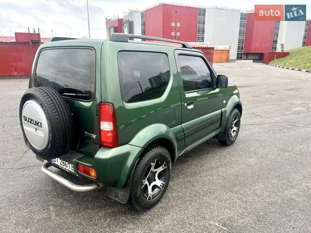 Зелений Сузукі Джімні, об'ємом двигуна 1.33 л та пробігом 112 тис. км за 12500 $, фото 5 на Automoto.ua