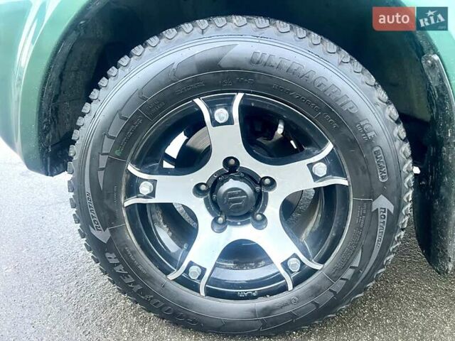Зелений Сузукі Джімні, об'ємом двигуна 1.33 л та пробігом 112 тис. км за 12500 $, фото 15 на Automoto.ua