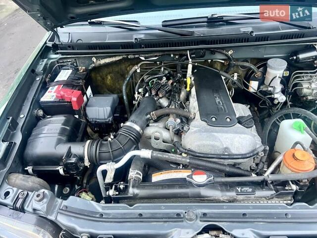 Зелений Сузукі Джімні, об'ємом двигуна 1.33 л та пробігом 112 тис. км за 12500 $, фото 14 на Automoto.ua