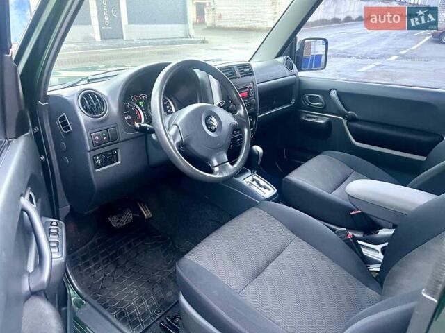 Зелений Сузукі Джімні, об'ємом двигуна 1.33 л та пробігом 112 тис. км за 12500 $, фото 9 на Automoto.ua