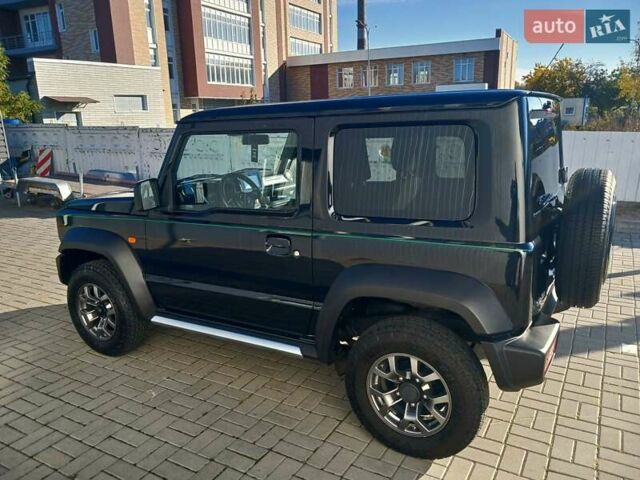 Зеленый Сузуки Джимни, объемом двигателя 1.46 л и пробегом 52 тыс. км за 20990 $, фото 12 на Automoto.ua