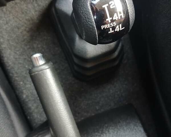 Зеленый Сузуки Джимни, объемом двигателя 1.46 л и пробегом 52 тыс. км за 20990 $, фото 24 на Automoto.ua