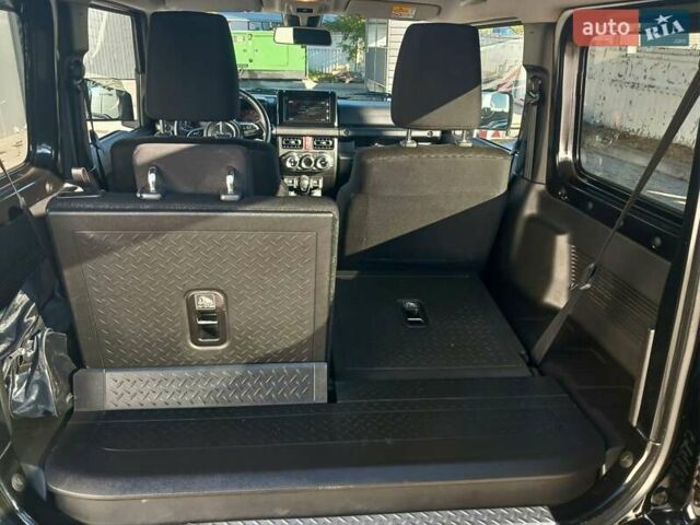 Зеленый Сузуки Джимни, объемом двигателя 1.46 л и пробегом 52 тыс. км за 20990 $, фото 18 на Automoto.ua