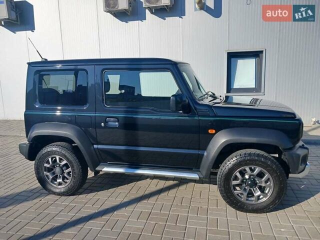 Зеленый Сузуки Джимни, объемом двигателя 1.46 л и пробегом 52 тыс. км за 20990 $, фото 2 на Automoto.ua