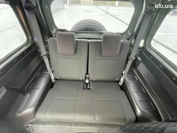 Зеленый Сузуки Джимни, объемом двигателя 1.5 л и пробегом 28 тыс. км за 22000 $, фото 5 на Automoto.ua