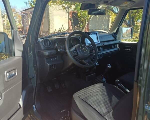 Зеленый Сузуки Джимни, объемом двигателя 1.46 л и пробегом 8 тыс. км за 20000 $, фото 2 на Automoto.ua