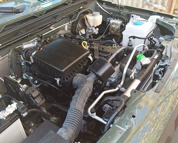 Зеленый Сузуки Джимни, объемом двигателя 1.46 л и пробегом 8 тыс. км за 20000 $, фото 7 на Automoto.ua