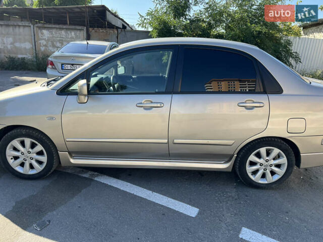 Бежевый Сузуки Лиана, объемом двигателя 1.59 л и пробегом 254 тыс. км за 4500 $, фото 5 на Automoto.ua