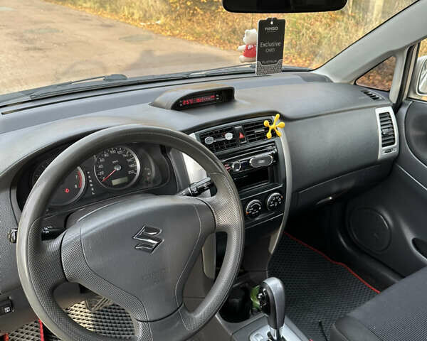 Бежевий Сузукі Ліана, об'ємом двигуна 1.59 л та пробігом 186 тис. км за 4200 $, фото 5 на Automoto.ua