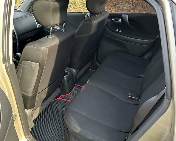 Бежевий Сузукі Ліана, об'ємом двигуна 1.59 л та пробігом 186 тис. км за 4200 $, фото 11 на Automoto.ua