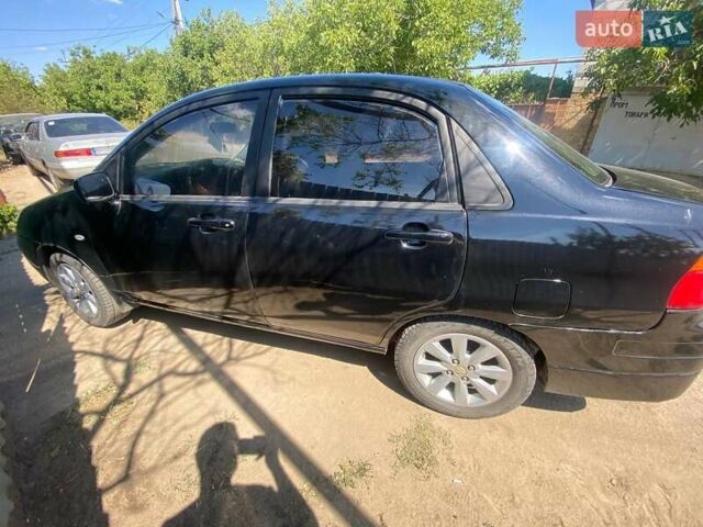 Черный Сузуки Лиана, объемом двигателя 1.6 л и пробегом 260 тыс. км за 4000 $, фото 6 на Automoto.ua