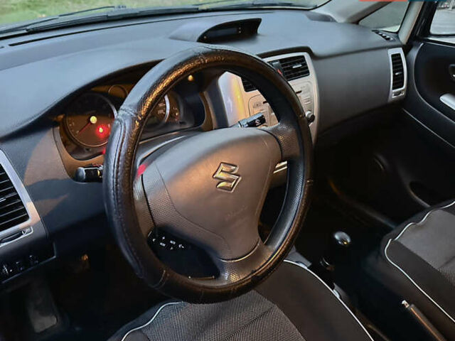 Чорний Сузукі Ліана, об'ємом двигуна 1.6 л та пробігом 192 тис. км за 4900 $, фото 10 на Automoto.ua