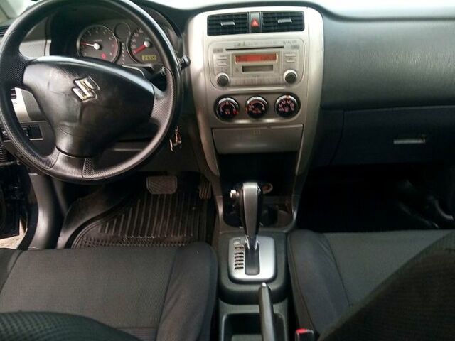 Черный Сузуки Лиана, объемом двигателя 1.6 л и пробегом 218 тыс. км за 5200 $, фото 6 на Automoto.ua