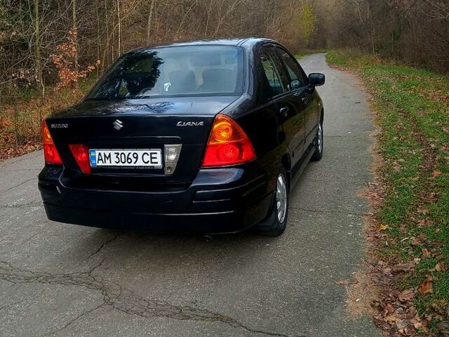 Черный Сузуки Лиана, объемом двигателя 1.6 л и пробегом 218 тыс. км за 5200 $, фото 2 на Automoto.ua