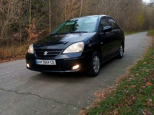 Черный Сузуки Лиана, объемом двигателя 1.6 л и пробегом 218 тыс. км за 5200 $, фото 1 на Automoto.ua