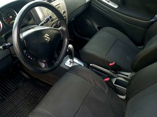 Черный Сузуки Лиана, объемом двигателя 1.6 л и пробегом 218 тыс. км за 5200 $, фото 7 на Automoto.ua