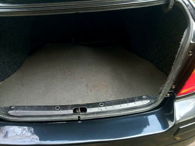 Черный Сузуки Лиана, объемом двигателя 1.6 л и пробегом 218 тыс. км за 5200 $, фото 9 на Automoto.ua